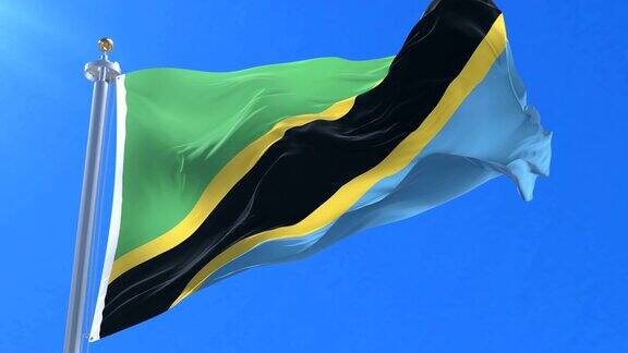 坦桑尼亚的国旗在蓝天中缓缓飘扬盘旋