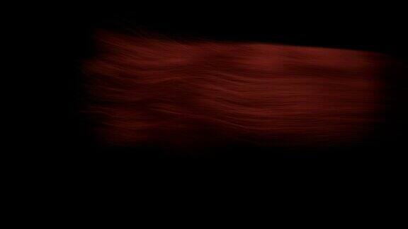 红头发在黑暗的背景下摇摆