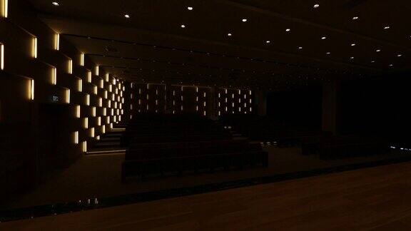 在空无一人的会议大厅里灯开着关着有一排排供观众和观众使用的座位