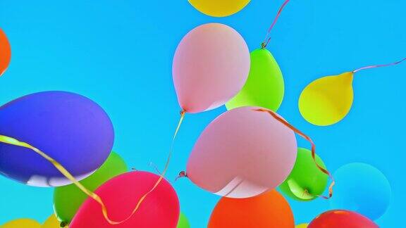 彩色的气球漂浮在蓝天上