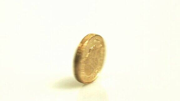 英镑硬币旋转的慢动作