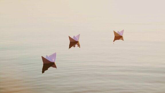 三艘白色的纸船在日落时漂浮在河上