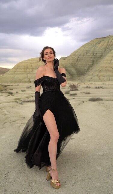 俄罗斯模特穿着黑色裙子散步和拍照