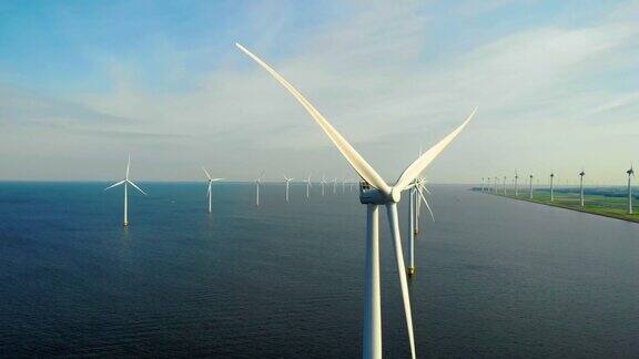 绿色能源海洋中的风车涡轮机荷兰风车公园的鸟瞰图