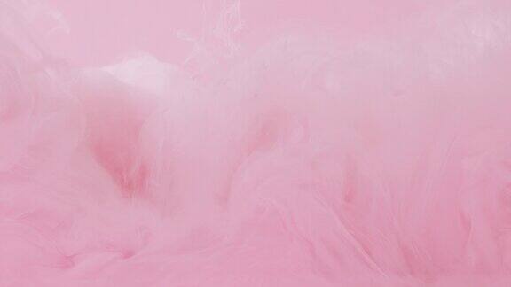 粉红色颜料流动的抽象背景
