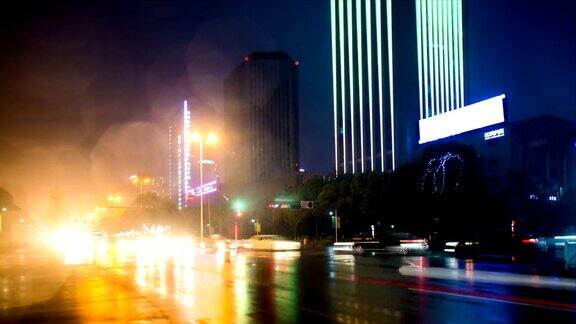 繁忙的交通夜晚灯火通明的杭州建筑时光流逝