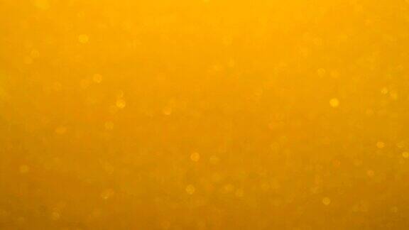 金波背景艺术黄金背景金色的沙子灰尘创造抽象的云的形成缓慢的运动黄金材质惊人的变形闪亮闪亮的粒子散焦模糊散焦