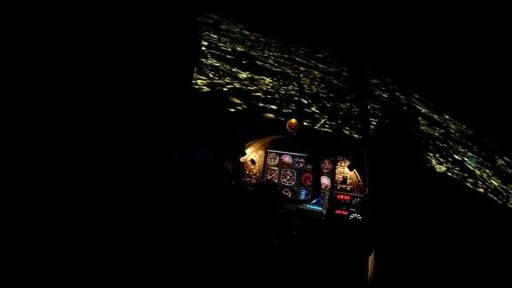 客机夜间降落机场跑道时飞行员控制面板上的飞行数据