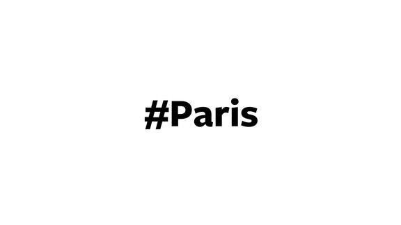 一个人在电脑屏幕上输入“#巴黎”