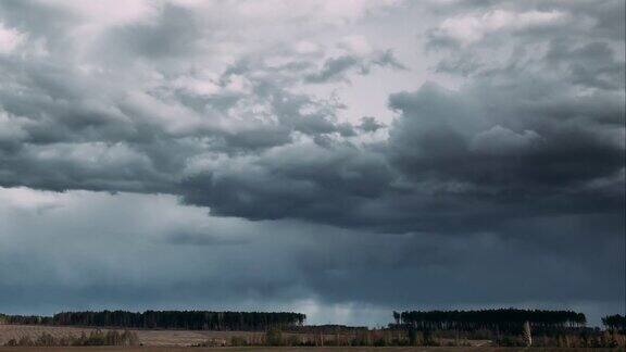 TimeLapseTime-LapseTime-LapseOfRuralFieldSpringMeadowLandscapeUnderScenicDramaticSkyBeforeAndDuringRa