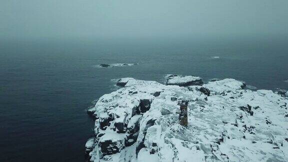 古老的灯塔巴伦支海科拉半岛北冰洋冬季景观