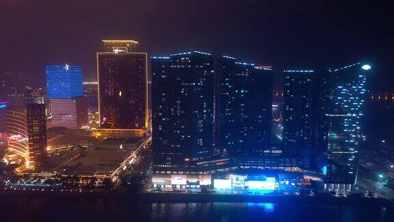 夜间灯光照亮澳门市区酒店海湾航拍4k中国全景