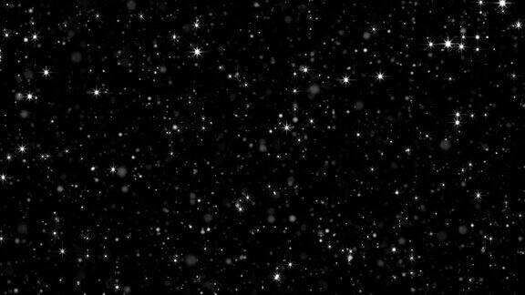 恒星背景干净的白色粒子在黑色背景闪烁的粒子与散景循环