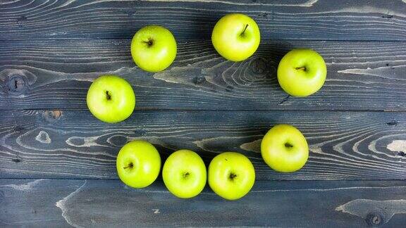 苹果微笑的延时动画停止运动新鲜水果在木桌上4K概念牙科健身健康饮食