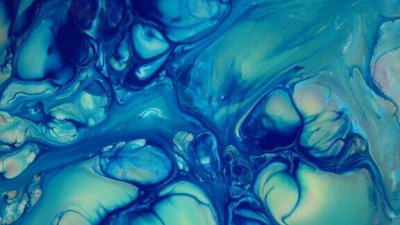 4k墨水在水里彩色墨水在水中反应形成抽象的背景