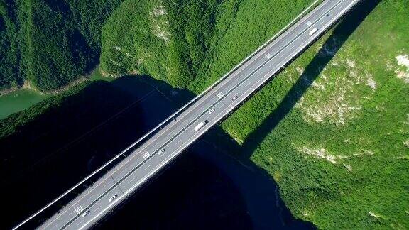航拍中国湖北四渡河悬索桥上的交通景观