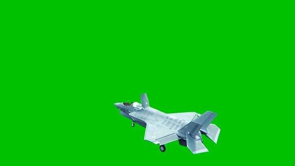 晴朗的一天F-35战斗机在绿色屏幕前从航空母舰上垂直起飞