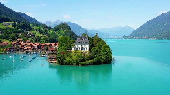 美丽的西堡城堡在蓝色的湖中央完美的旅行目的地下的蓝天在瑞士-4K