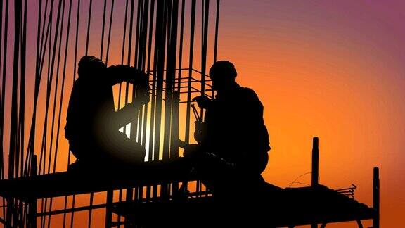 建筑工人们在日落时分建造摩天大楼