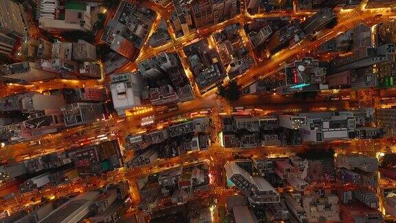 傍晚时分照亮香港城市交通街道体育场高空俯视图4k