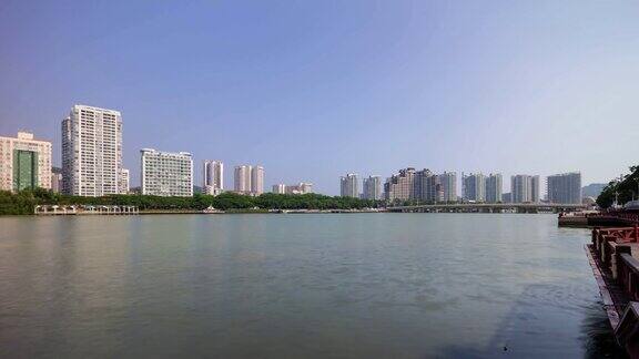 阳光明媚的傍晚三亚市河边全景4k时间推移海南岛中国