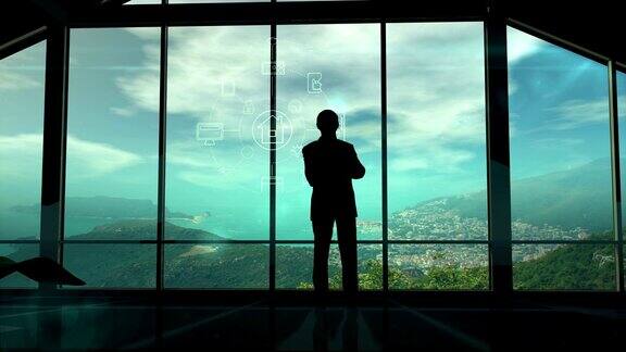 一名男子站在窗口查看物联网信息图元素