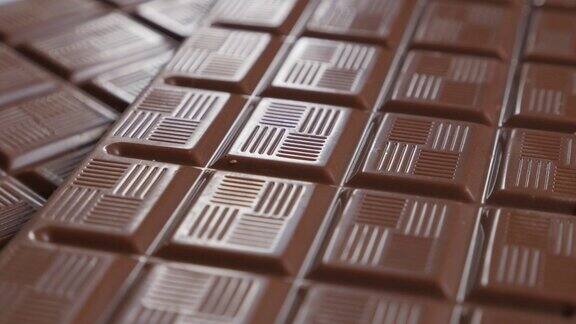 背景巧克力棒和方块流行糖果浅景深倾斜4K