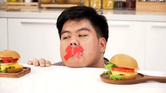 泰国超重男子被禁止吃汉堡、啤酒等不健康食品