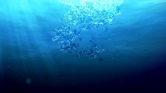 气泡和阳光在深蓝色的海洋3d渲染