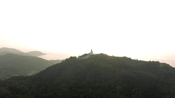 普吉岛日落全高清无人机飞行山上的大佛雕像