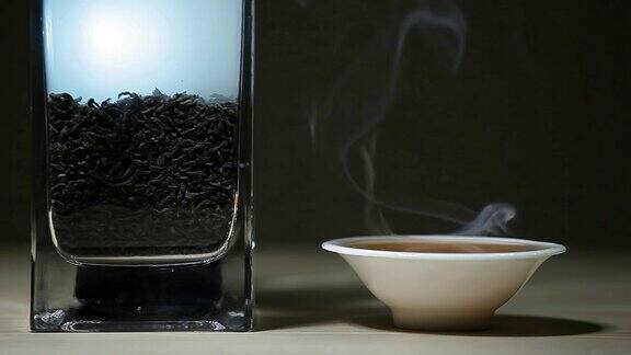 黑热中国茶杯烟木桌黑色背景无人高清画面