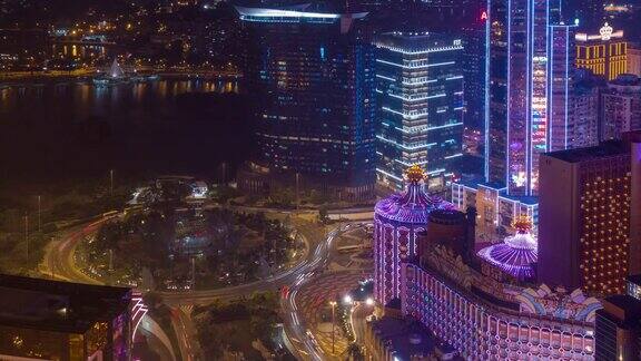 夜晚照亮澳门城市景观交通街道屋顶全景4k时间推移中国