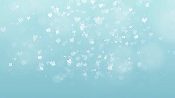 运动图形的蓝色粒子心形状的爱的情人节庆祝悬浮在粉蓝色背景