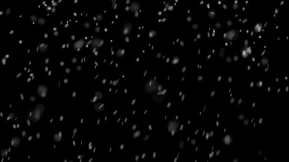 4K真实的雪花颗粒从夜空坠落