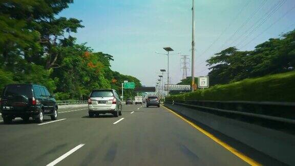 白天时间雅加达城市交通街道出租车公路旅行到机场前全景4k印度尼西亚