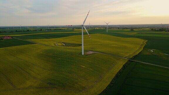 风力涡轮机产生电能建在农田上
