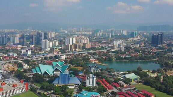 晴朗的一天吉隆坡市中心著名的公园湖空中全景4k马来西亚