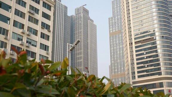 日落时分青岛市区现代办公大楼前慢镜头全景4k中国