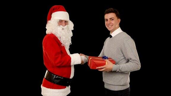 年轻的商人收到圣诞老人的礼物握手卢马附上
