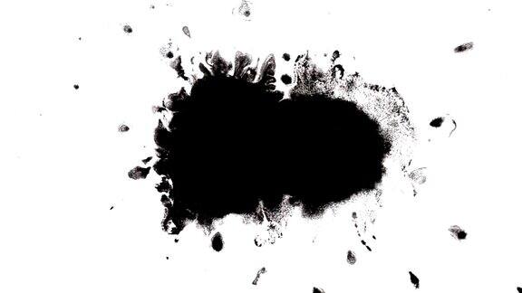 黑色的墨水在白色的表面上产生污点