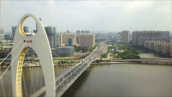 阳光明媚的一天广州市交通里德大桥珠江航拍全景倾斜4k中国