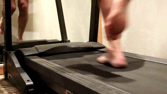 男人在健身房跑步机上运动健身和健康的生活方式4k