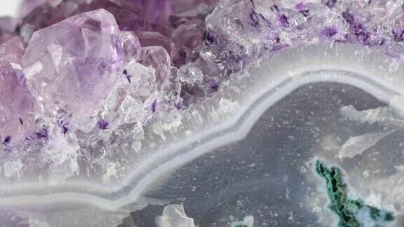 宝石上的紫水晶晶洞晶体极端近距离微距拍摄与滑动
