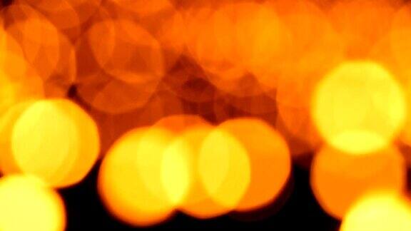 蜡烛背景的3个镜头橙色模糊散焦