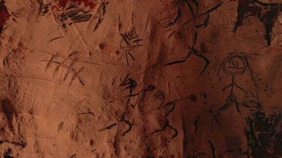 原始史前尼安德特人的动物和抽象画篝火照亮夜晚的墙壁创造第一个岩画洞穴艺术倾斜浮动相机角度