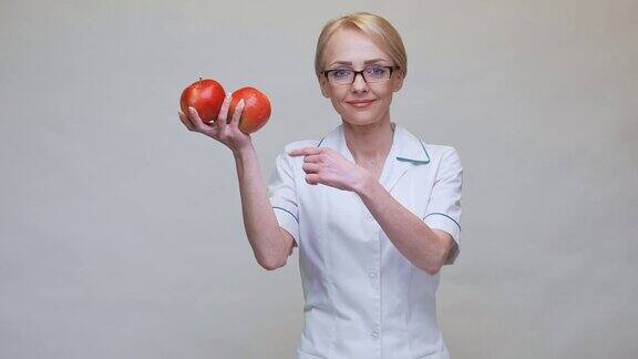 营养学家医生健康生活理念-持有机红苹果
