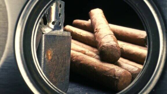 雪茄装在带打火机的雪茄盒里透过雪茄切割器看
