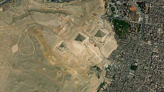 卫星开罗吉萨金字塔地图背景循环在埃及城市上空盘旋无缝全景旋转在市中心的背景