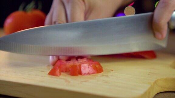 用菜刀切番茄背景为淡散焦