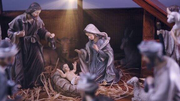耶稣基督诞生场景与雕像在稳定和轻粒子